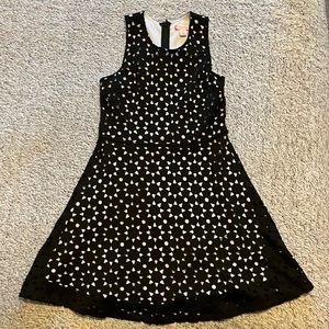 A black and white cut-out dress. A girls size 12 made by Ruby and Bloom.